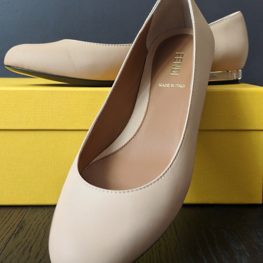 Nude Fendi flats.